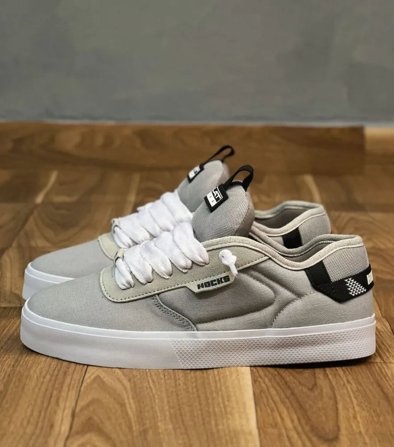 Tênis hocks flat core cascalho